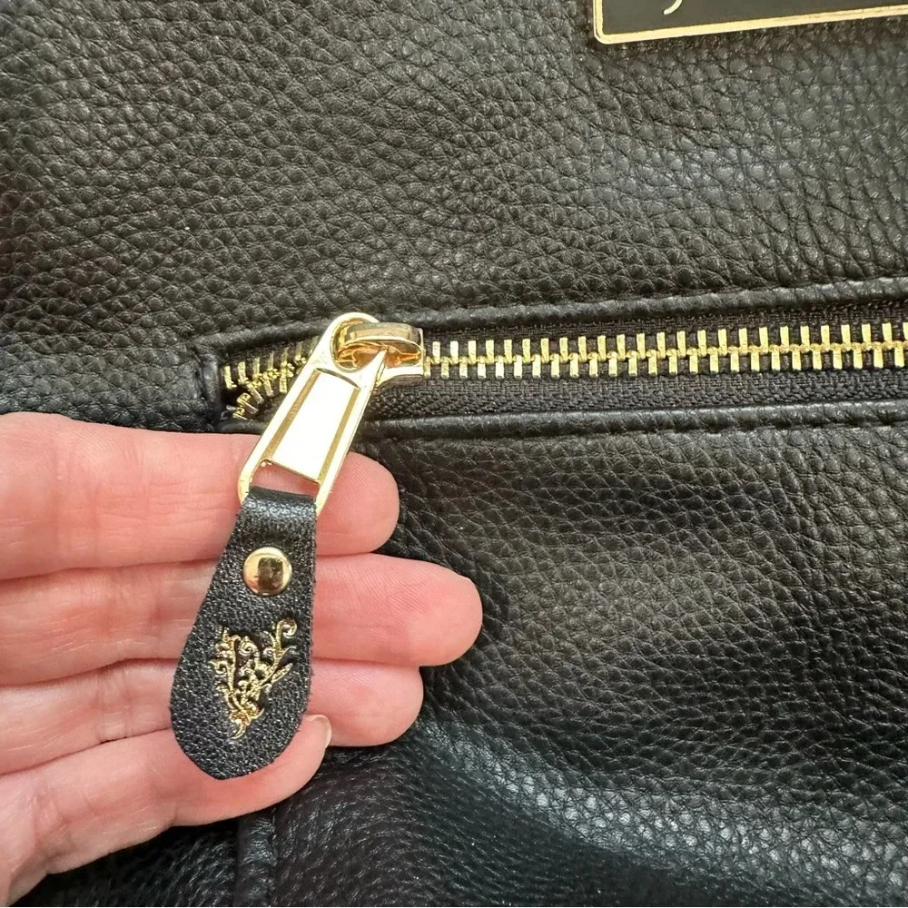 Younique Women’s Black Faux Leather Backpack with gold Zipper & Logo Details GUC